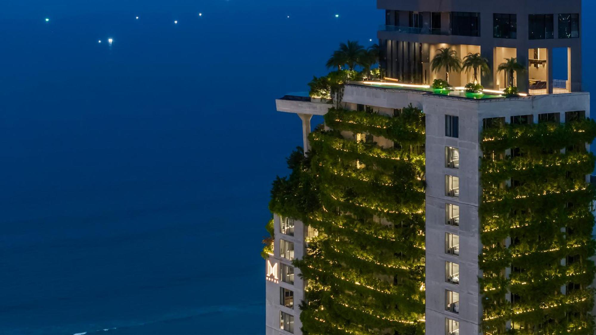 M Hotel Danang Экстерьер фото The vertical forest at night