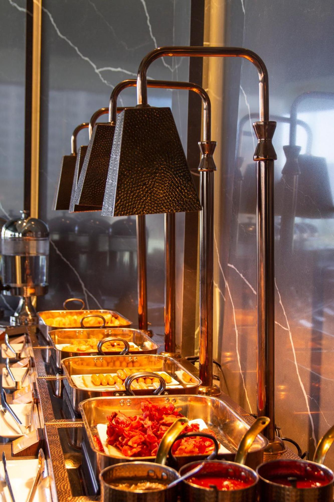 M Hotel Danang Экстерьер фото A chafing dish